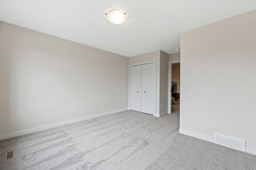 43 Versant View Sw, Calgary, AB - Indoor Photo Showing Other Room