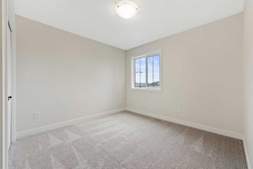 43 Versant View Sw, Calgary, AB - Indoor Photo Showing Other Room