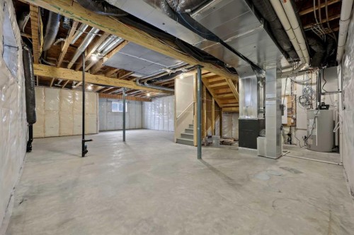 43 Versant View Sw, Calgary, AB - Indoor Photo Showing Basement