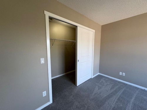 135 Chapalina Square Se, Calgary, AB - Indoor Photo Showing Other Room