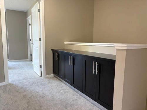 135 Chapalina Square Se, Calgary, AB - Indoor Photo Showing Other Room