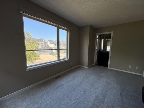 135 Chapalina Square Se, Calgary, AB - Indoor Photo Showing Other Room