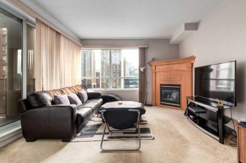 1301-683 10 Street Sw, Calgary, AB - Indoor Photo Showing Living Room With Fireplace