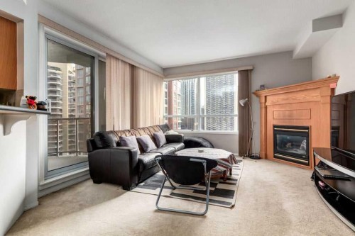 1301-683 10 Street Sw, Calgary, AB - Indoor Photo Showing Living Room With Fireplace