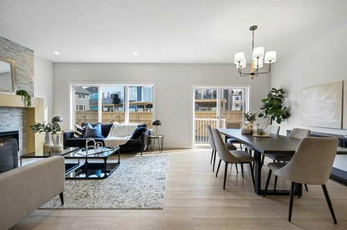 91 Versant Way Sw, Calgary, AB - Indoor With Fireplace