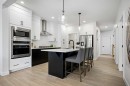 91 Versant Way Sw, Calgary, AB  - Indoor Photo Showing Kitchen With Upgraded Kitchen 