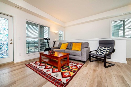 120 Spring Creek Common Sw, Calgary, AB - Indoor Photo Showing Living Room