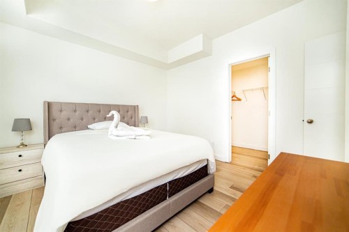 120 Spring Creek Common Sw, Calgary, AB - Indoor Photo Showing Bedroom