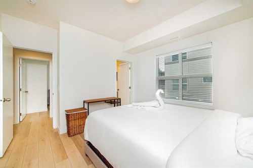 120 Spring Creek Common Sw, Calgary, AB - Indoor Photo Showing Bedroom