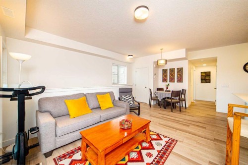 120 Spring Creek Common Sw, Calgary, AB - Indoor Photo Showing Living Room