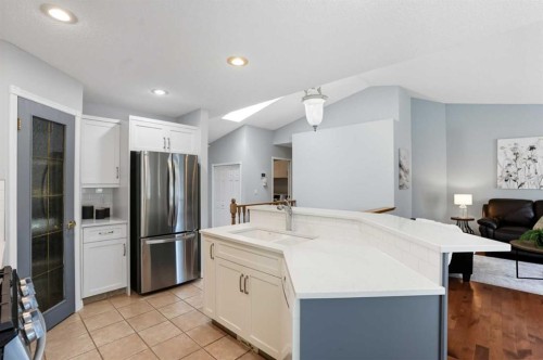 12 Bow Way, Cochrane, AB - Indoor Photo Showing Kitchen With Stainless Steel Kitchen