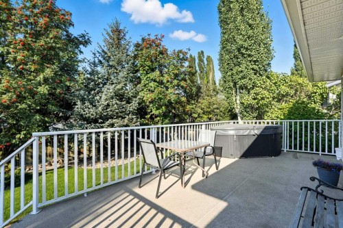12 Bow Way, Cochrane, AB - Outdoor With Deck Patio Veranda