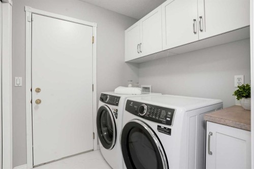 12 Bow Way, Cochrane, AB - Indoor Photo Showing Laundry Room