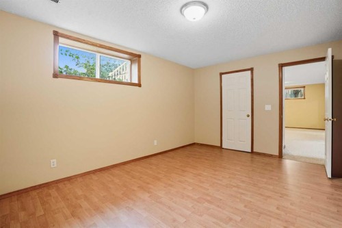 12 Bow Way, Cochrane, AB - Indoor Photo Showing Other Room