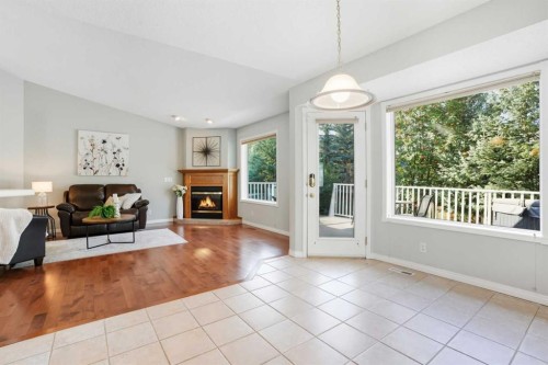12 Bow Way, Cochrane, AB - Indoor Photo Showing Living Room With Fireplace