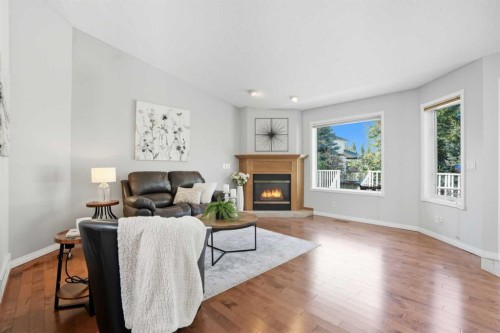 12 Bow Way, Cochrane, AB - Indoor Photo Showing Living Room With Fireplace