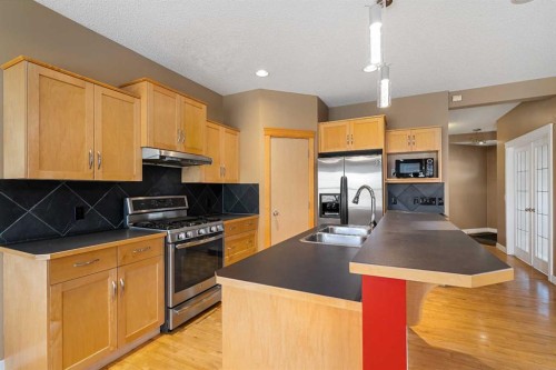78 New Brighton Manor Se, Calgary, AB - Indoor Photo Showing Kitchen With Stainless Steel Kitchen With Double Sink