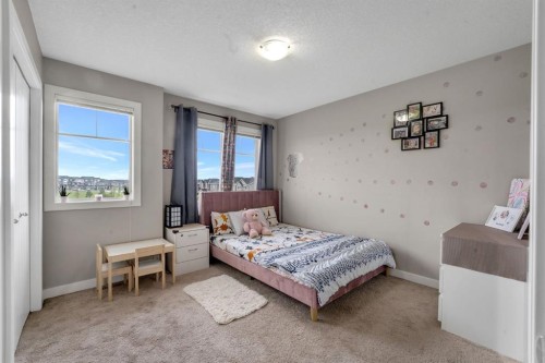 27 Redstone Circle Ne, Calgary, AB - Indoor Photo Showing Bedroom