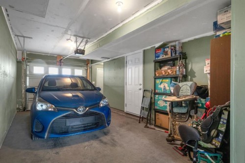 27 Redstone Circle Ne, Calgary, AB - Indoor Photo Showing Garage