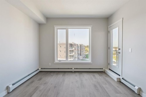 412-700 Shawnee Square Sw, Calgary, AB - Indoor Photo Showing Other Room
