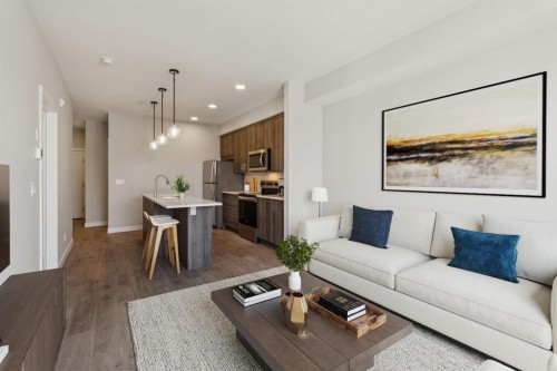 412-700 Shawnee Square Sw, Calgary, AB - Indoor Photo Showing Living Room
