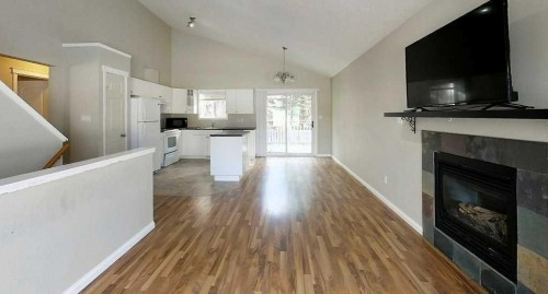 4155 15 Avenue, Edson, AB - Indoor Photo Showing Living Room With Fireplace