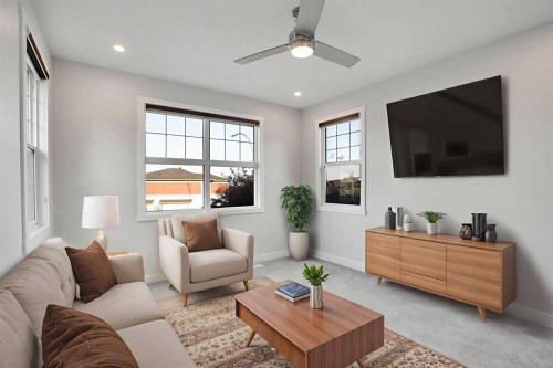 72 Panamount Manor Nw, Calgary, AB - Indoor Photo Showing Living Room