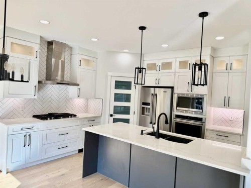 72 Panamount Manor Nw, Calgary, AB - Indoor Photo Showing Kitchen With Double Sink With Upgraded Kitchen