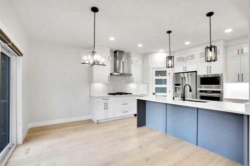 72 Panamount Manor Nw, Calgary, AB - Indoor Photo Showing Kitchen With Stainless Steel Kitchen With Upgraded Kitchen