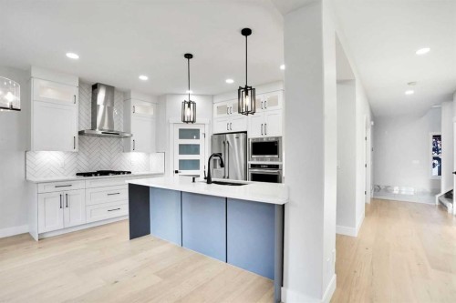 72 Panamount Manor Nw, Calgary, AB - Indoor Photo Showing Kitchen With Upgraded Kitchen