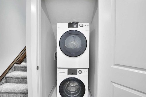 72 Panamount Manor Nw, Calgary, AB - Indoor Photo Showing Laundry Room