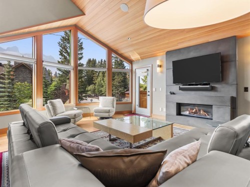 514 5Th Avenue, Canmore, AB - Indoor Photo Showing Living Room With Fireplace