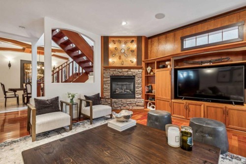 2605 4 Street Ne, Calgary, AB - Indoor Photo Showing Living Room With Fireplace