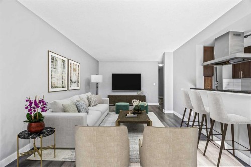 204-4455D Greenview Drive Ne, Calgary, AB - Indoor Photo Showing Living Room