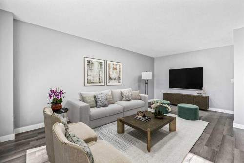 204-4455D Greenview Drive Ne, Calgary, AB - Indoor Photo Showing Living Room