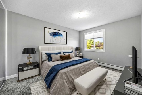 204-4455D Greenview Drive Ne, Calgary, AB - Indoor Photo Showing Bedroom