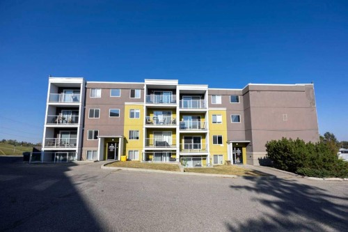 204-4455D Greenview Drive Ne, Calgary, AB - Outdoor With Balcony With Facade