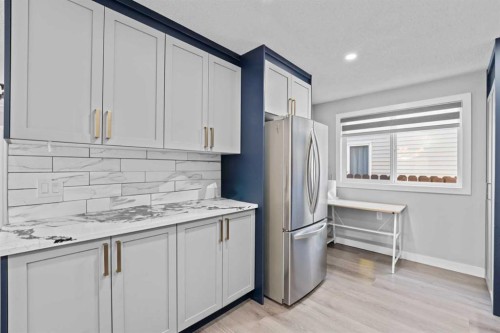 12 Cedargrove Road Sw, Calgary, AB - Indoor Photo Showing Kitchen
