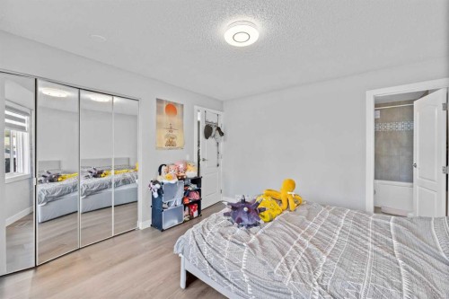 12 Cedargrove Road Sw, Calgary, AB - Indoor Photo Showing Bedroom