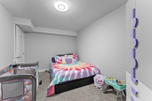 12 Cedargrove Road Sw, Calgary, AB - Indoor Photo Showing Bedroom
