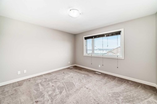 15 Evanscrest Way, Calgary, AB - Indoor Photo Showing Other Room