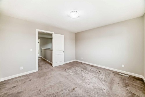 15 Evanscrest Way, Calgary, AB - Indoor Photo Showing Other Room