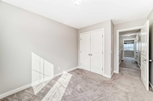 15 Evanscrest Way, Calgary, AB - Indoor Photo Showing Other Room