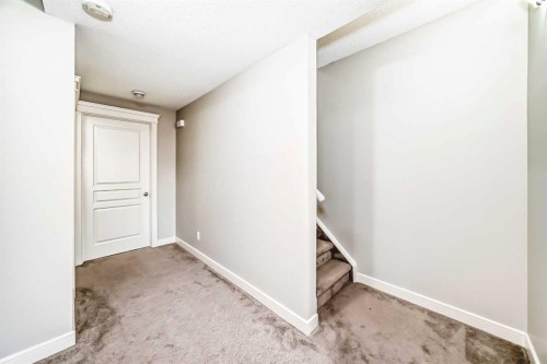 15 Evanscrest Way, Calgary, AB - Indoor Photo Showing Other Room