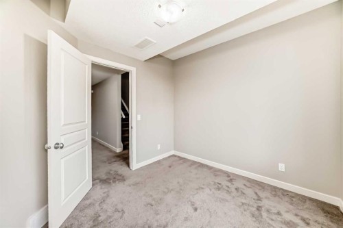15 Evanscrest Way, Calgary, AB - Indoor Photo Showing Other Room