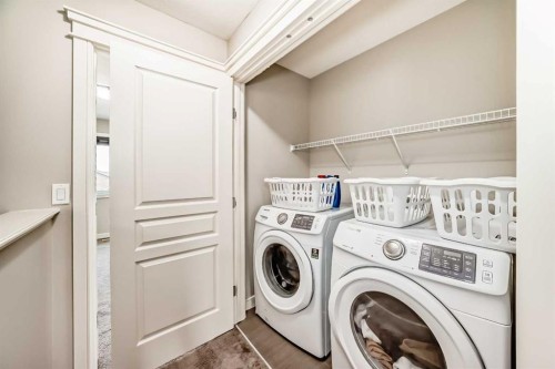 15 Evanscrest Way, Calgary, AB - Indoor Photo Showing Laundry Room