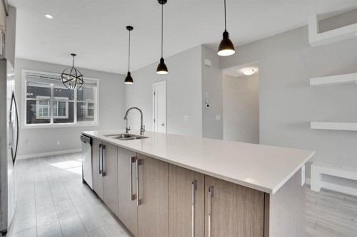 6469 128 Avenue Ne, Calgary, AB - Indoor Photo Showing Kitchen With Double Sink With Upgraded Kitchen