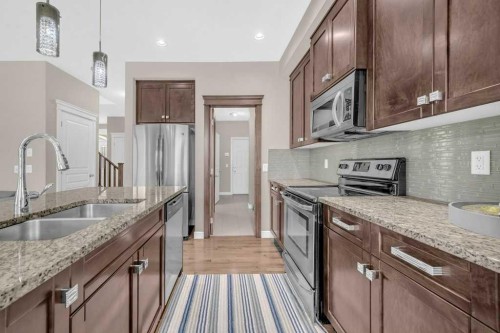 54 Redstone Mews Ne, Calgary, AB - Indoor Photo Showing Kitchen With Stainless Steel Kitchen With Double Sink With Upgraded Kitchen