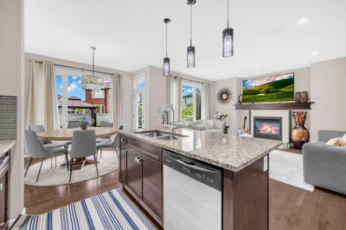 54 Redstone Mews Ne, Calgary, AB - Indoor Photo Showing Kitchen With Fireplace With Double Sink With Upgraded Kitchen