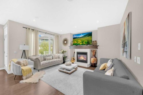 54 Redstone Mews Ne, Calgary, AB - Indoor Photo Showing Living Room With Fireplace